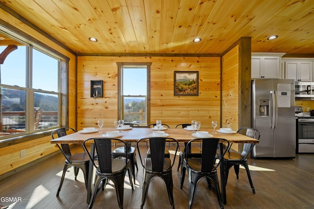 dining room with dark wood-type flooring, wooden ceiling, and recessed lighting