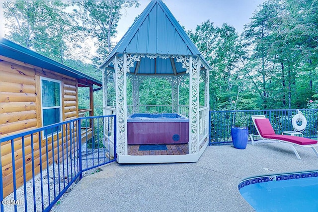 view of patio featuring a hot tub