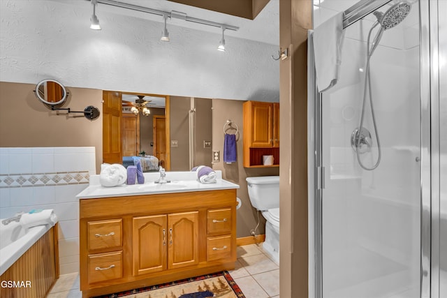 3501 Ginseng Way, Pigeon Forge, TN 37862 - full bathroom with tile patterned flooring, a stall shower, vanity, ceiling fan, and a bath