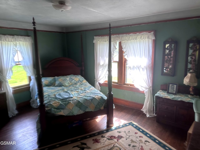 3451 Cosby Hwy, Cosby, TN 37722 - bedroom featuring baseboards, multiple windows, and wood finished floors