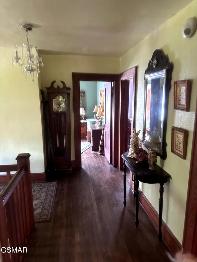 3451 Cosby Hwy, Cosby, TN 37722 - corridor with a chandelier and dark wood-type flooring