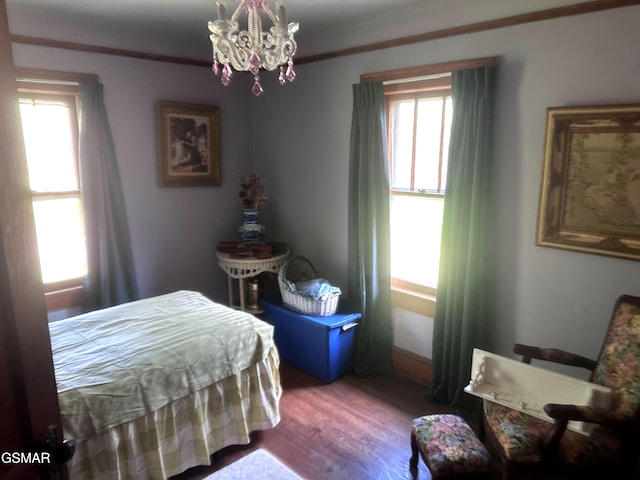 3451 Cosby Hwy, Cosby, TN 37722 - bedroom featuring crown molding, wood finished floors, a chandelier, and multiple windows