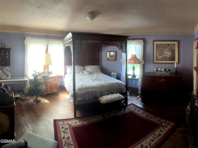 3451 Cosby Hwy, Cosby, TN 37722 - bedroom featuring wood finished floors