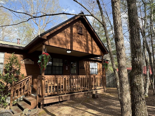view of front of house featuring metal roof