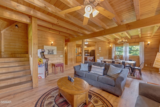 1619 Jed Trl, Sevierville, TN 37862 - living area with wood walls, light wood-style flooring, a chandelier, wooden ceiling with exposed beams, and ceiling fan