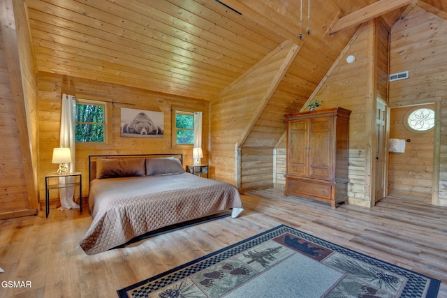 1619 Jed Trl, Sevierville, TN 37862 - bedroom featuring wood walls, light wood-style floors, wood ceiling with exposed beams, and high vaulted ceiling