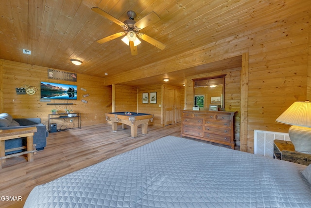 1619 Jed Trl, Sevierville, TN 37862 - bedroom featuring pool table, wood finished floors, wood walls, and wooden ceiling