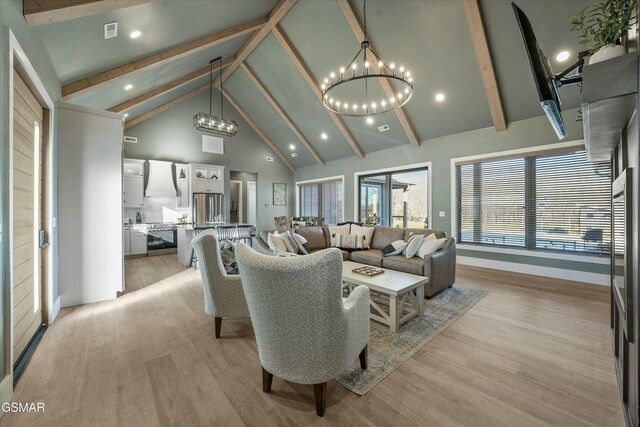 kitchen with tasteful backsplash, glass insert cabinets, appliances with stainless steel finishes, light stone counters, and premium range hood