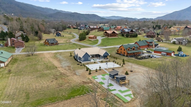 birds eye view of property featuring a residential view and a mountain view