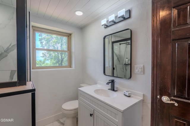 944 Smoky Mountain View Ct, Seymour, TN 37865 - bathroom featuring vanity, toilet, marble look tile flooring, a shower, and baseboards