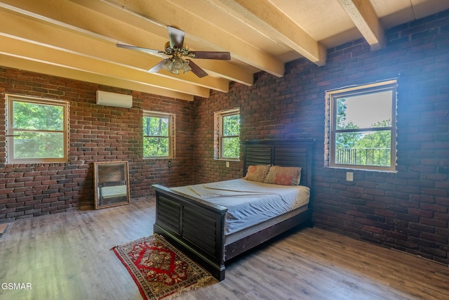 944 Smoky Mountain View Ct, Seymour, TN 37865 - bedroom featuring a wall mounted air conditioner, brick wall, wood finished floors, and beamed ceiling