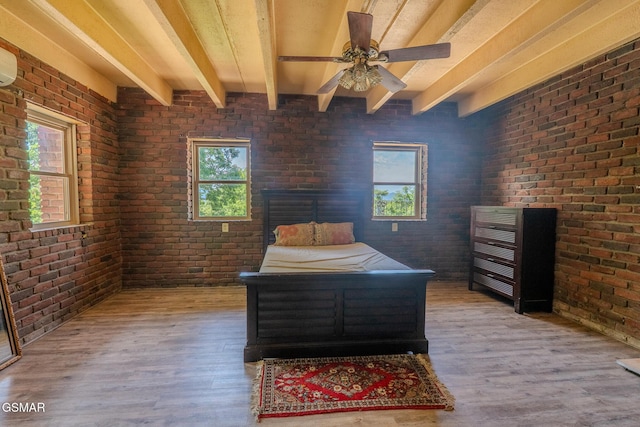 944 Smoky Mountain View Ct, Seymour, TN 37865 - bedroom with brick wall, beamed ceiling, and wood finished floors
