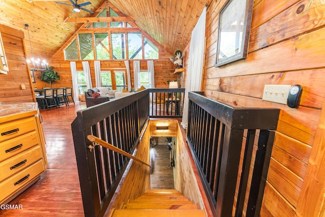 3186 Emerald Springs Loop, Pigeon Forge, TN 37862 - stairs with wooden walls, wood ceiling, hardwood / wood-style flooring, high vaulted ceiling, and a ceiling fan