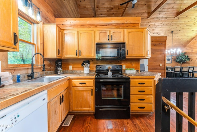 3186 Emerald Springs Loop, Pigeon Forge, TN 37862 - kitchen featuring black appliances, wooden ceiling, a sink, dark wood-style floors, and wood walls