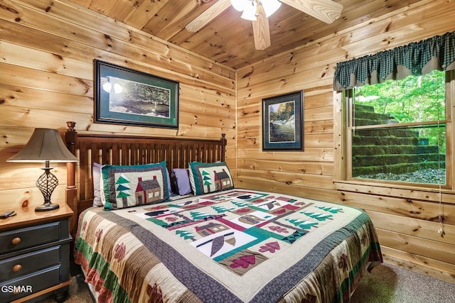 3828 Saddle Brook Way, Sevierville, TN 37862 - carpeted bedroom featuring wooden ceiling, ceiling fan, and wooden walls