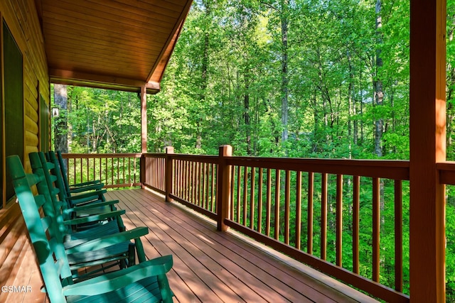 3828 Saddle Brook Way, Sevierville, TN 37862 - wooden terrace with a wooded view