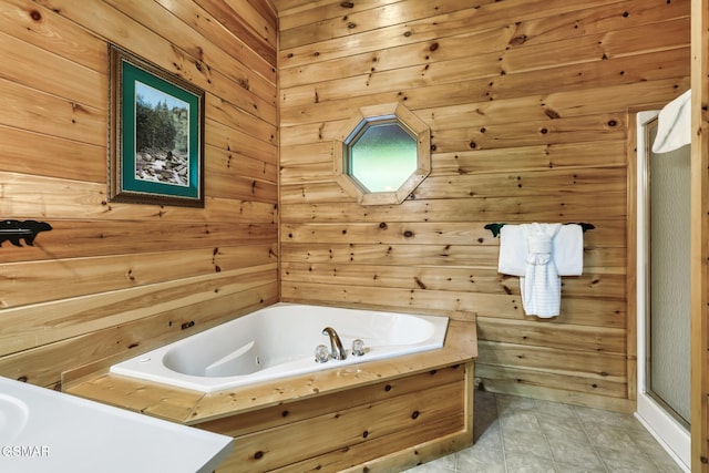 3828 Saddle Brook Way, Sevierville, TN 37862 - full bathroom with tile patterned floors, a garden tub, and wooden walls