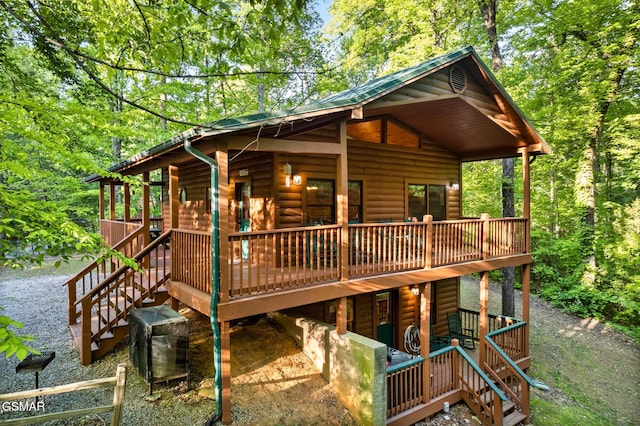 3828 Saddle Brook Way, Sevierville, TN 37862 - exterior space with stairs, a wooden deck, and faux log siding