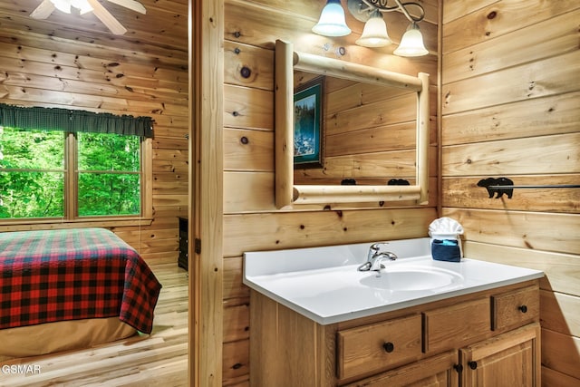 3828 Saddle Brook Way, Sevierville, TN 37862 - bathroom with wooden walls and vanity