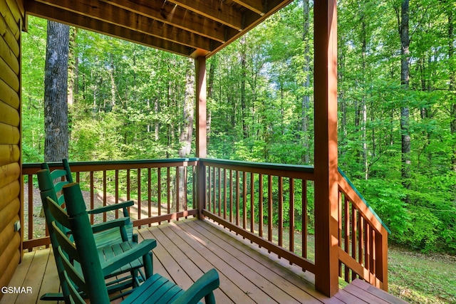 3828 Saddle Brook Way, Sevierville, TN 37862 - wooden deck with a forest view