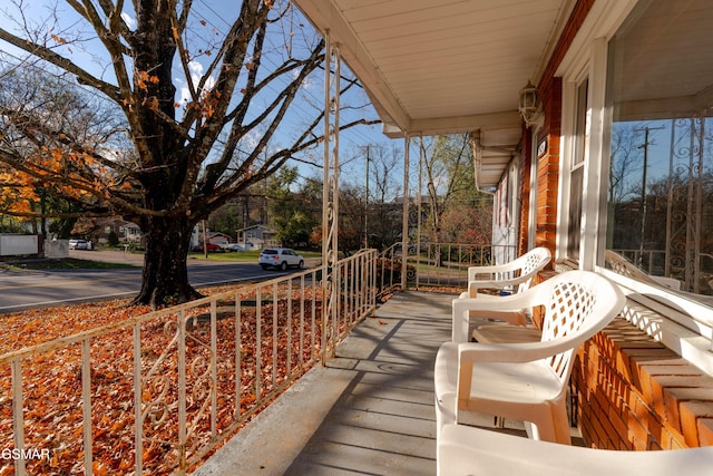 balcony featuring a porch