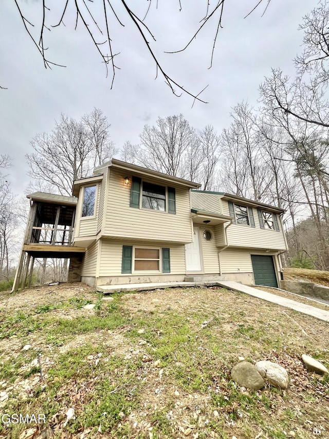 view of front of property featuring an attached garage