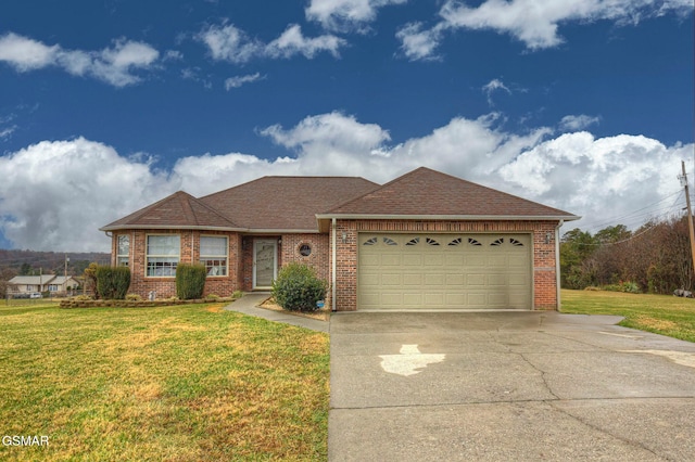 view of front facade featuring a front yard and a garage