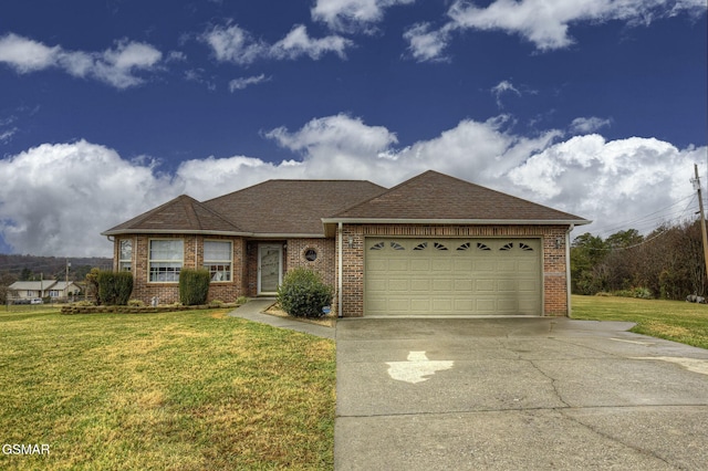 view of front of home featuring a garage and a front lawn