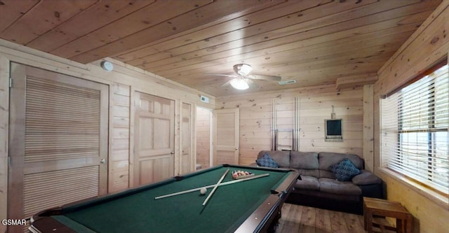 playroom with hardwood / wood-style flooring, wood ceiling, wood walls, and pool table