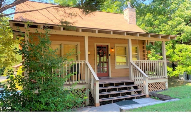 entrance to property with a porch