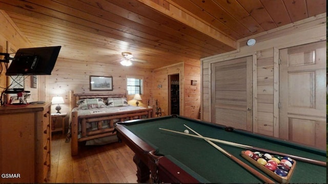 recreation room featuring wood walls, wooden ceiling, and pool table