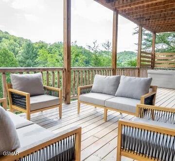 deck with an outdoor hangout area