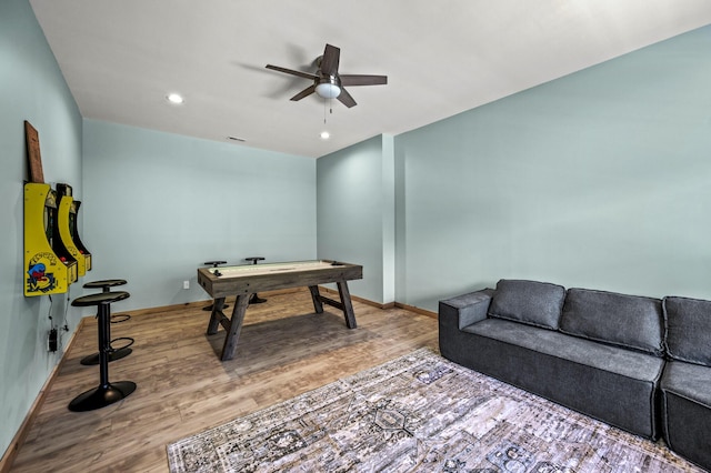 playroom with hardwood / wood-style floors and ceiling fan