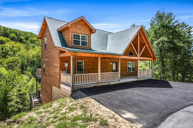 log home with a porch