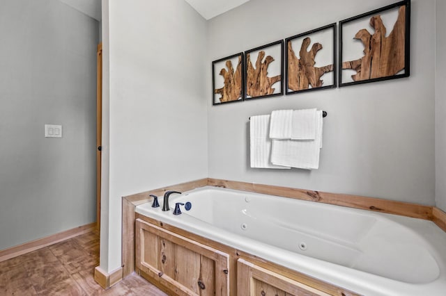 bathroom featuring a tub
