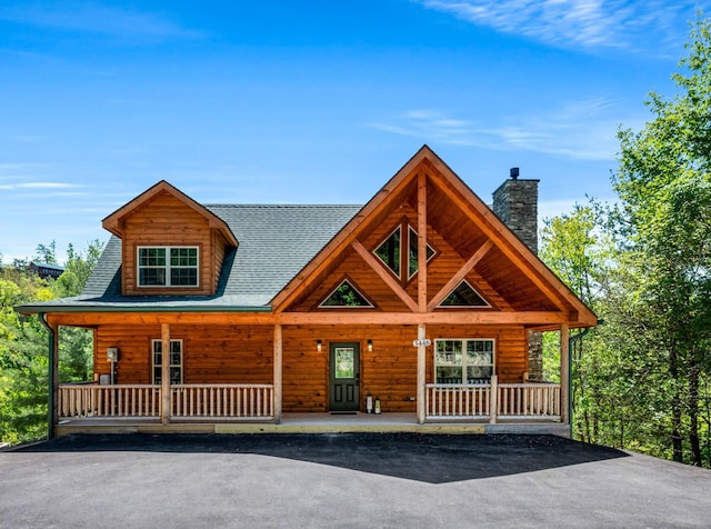 log home with a porch