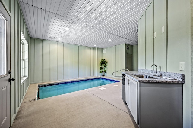 view of pool featuring sink