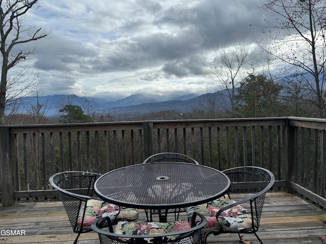 wooden terrace featuring a mountain view