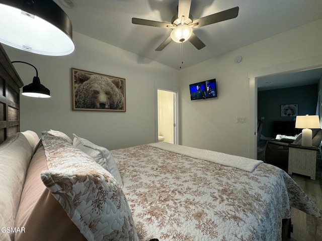 bedroom featuring wood finished floors and ceiling fan