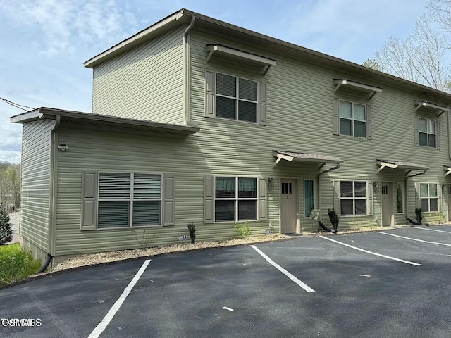 exterior space featuring uncovered parking