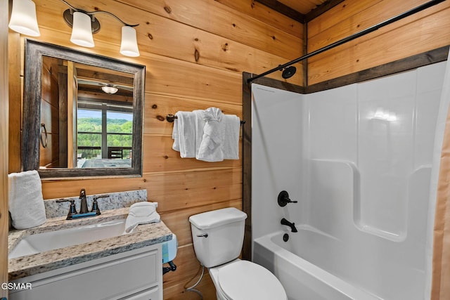 4541 Shangrila Way, Sevierville, TN 37876 - full bath with wooden walls, toilet, shower / bathing tub combination, and vanity