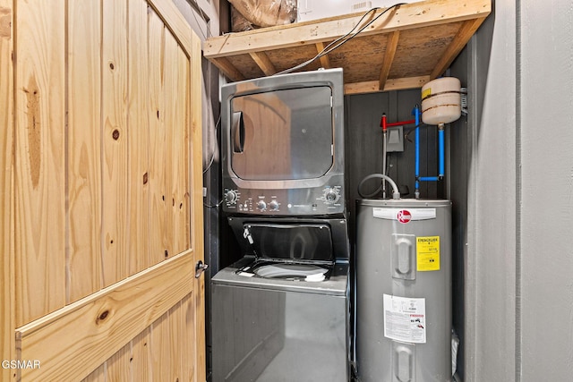 4541 Shangrila Way, Sevierville, TN 37876 - washroom featuring stacked washing maching and dryer, laundry area, and electric water heater