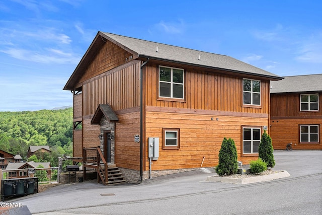 4541 Shangrila Way, Sevierville, TN 37876 - view of property exterior with board and batten siding and a shingled roof