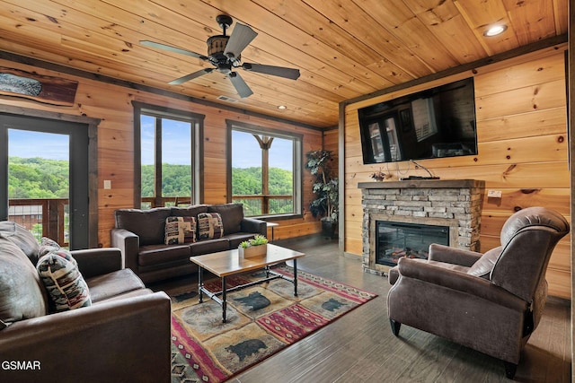 4541 Shangrila Way, Sevierville, TN 37876 - living room featuring wooden walls, wood ceiling, and plenty of natural light