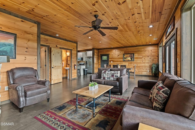 4541 Shangrila Way, Sevierville, TN 37876 - living area with recessed lighting, ceiling fan, wood walls, and wood ceiling