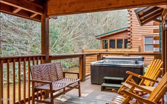 311 Caney Creek Rd, Pigeon Forge, TN 37863 - wooden deck with a hot tub