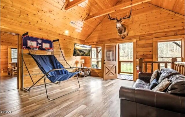 311 Caney Creek Rd, Pigeon Forge, TN 37863 - living area with wood walls, wood ceiling, and wood finished floors
