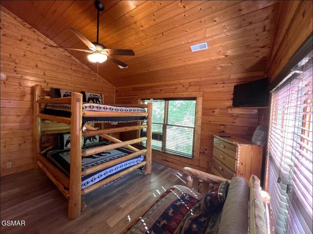 311 Caney Creek Rd, Pigeon Forge, TN 37863 - bedroom featuring lofted ceiling, wood walls, wood finished floors, and wood ceiling