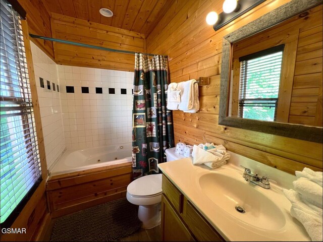 311 Caney Creek Rd, Pigeon Forge, TN 37863 - full bath with vanity, wood walls, wooden ceiling, and a combined bath / shower with jetted tub