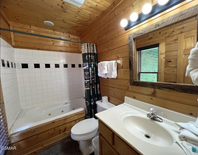 311 Caney Creek Rd, Pigeon Forge, TN 37863 - full bathroom featuring wood walls, vanity, a combined bath / shower with jetted tub, and wood ceiling